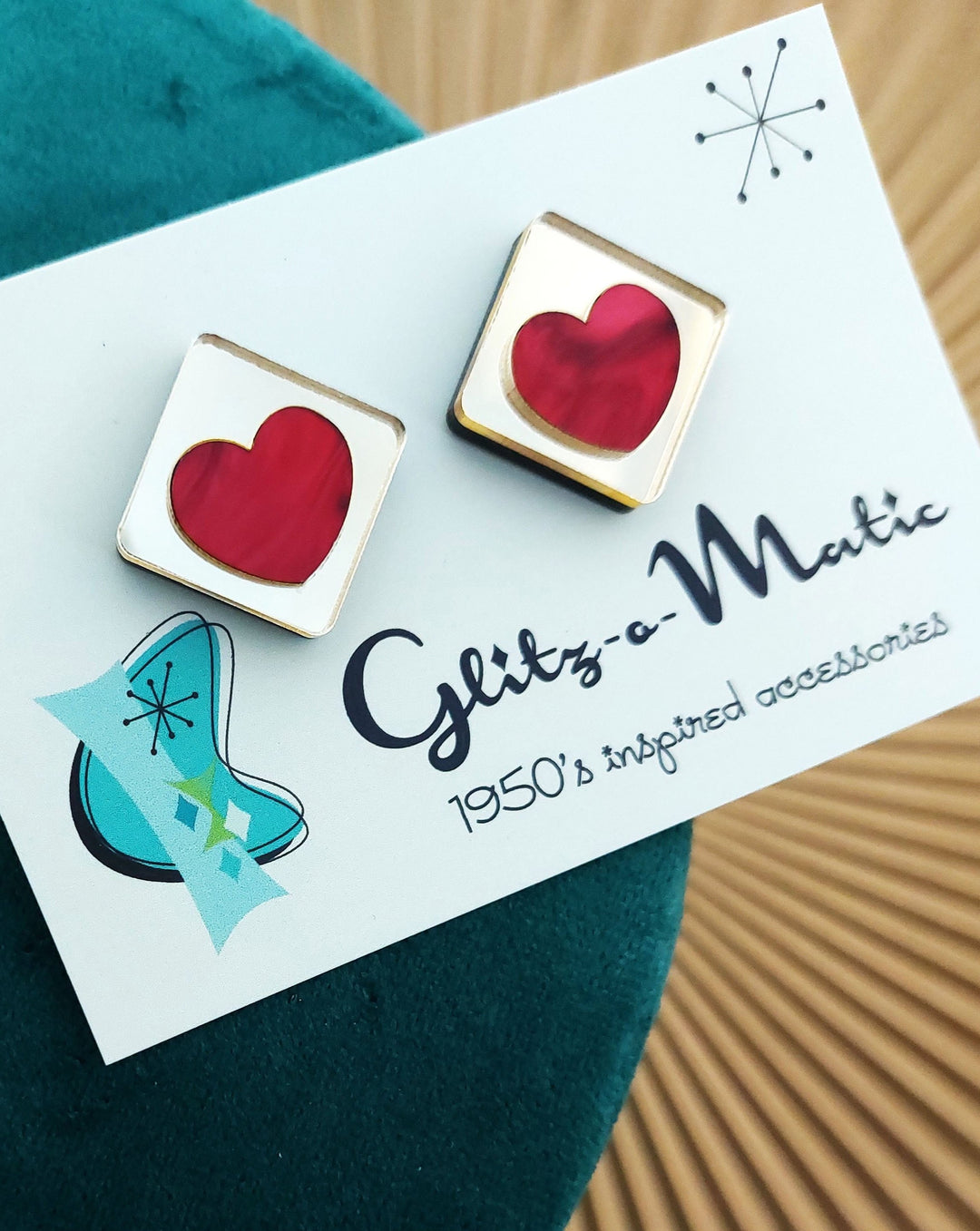 Glitz-o-Matic – Pendientes Corazón de Oro