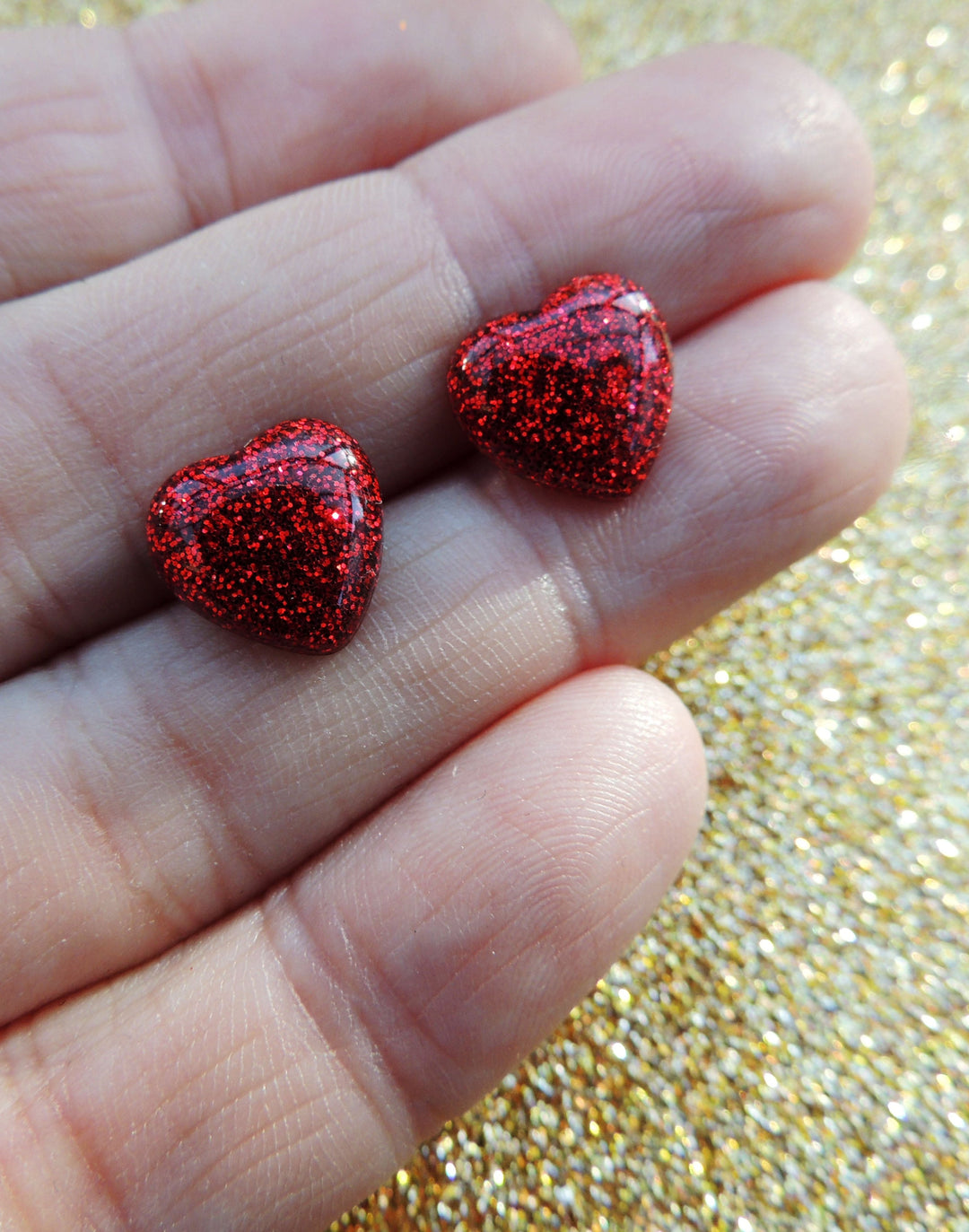 Glitz-o-Matic – Pendientes de corazón con brillo en rojo